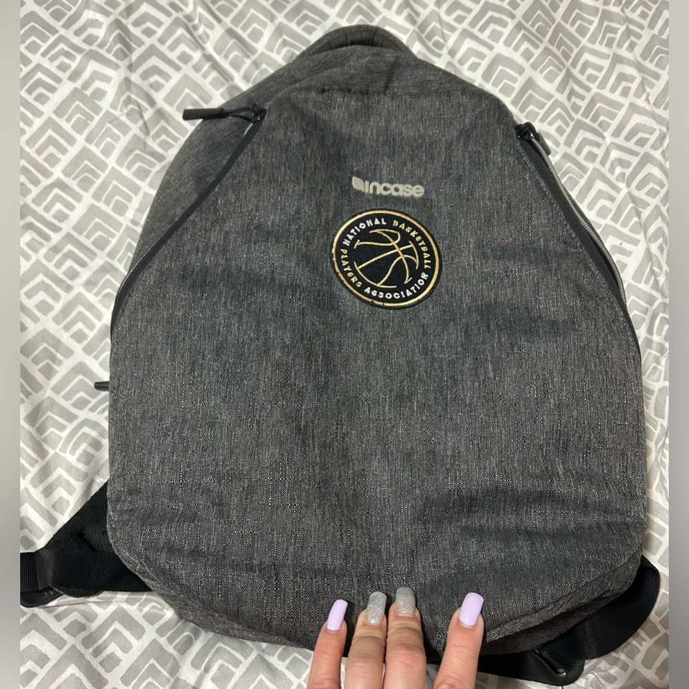 Used Incase backpack/Grey-has “National basketball players association” patch